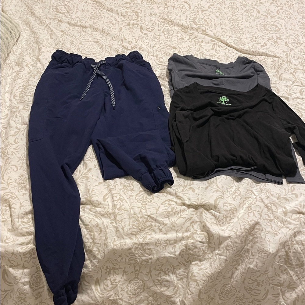 Scrubs navy pants with plain tops